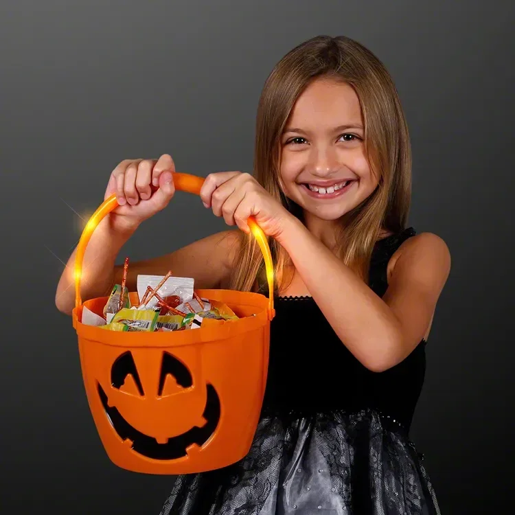 Pumpkin Light Handle Halloween Buckets held in hand