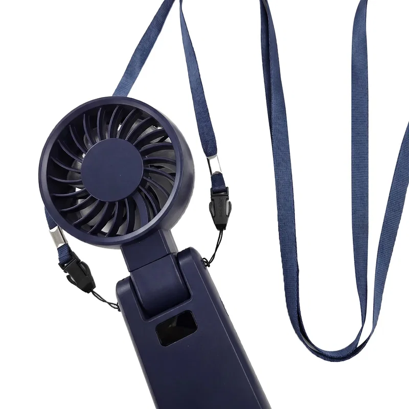 Purl Fan clipped to a stroller rail, angled in-use shot
