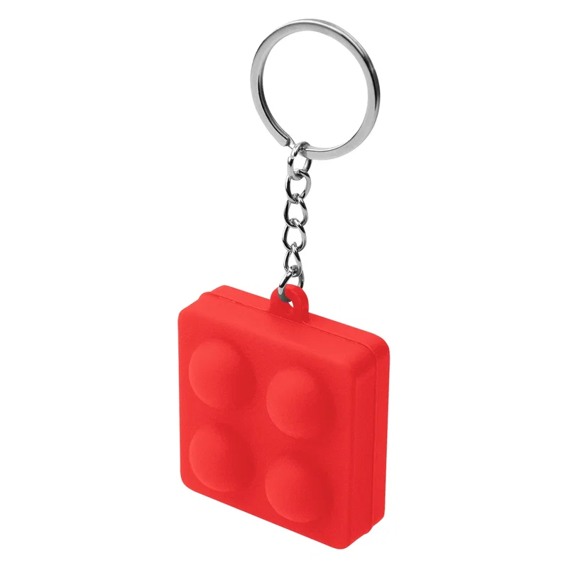 Reverse angle showing the far side of the push pop keychain