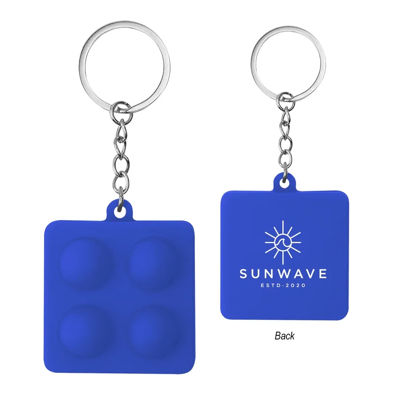 Photographed from directly above the push pop keychain