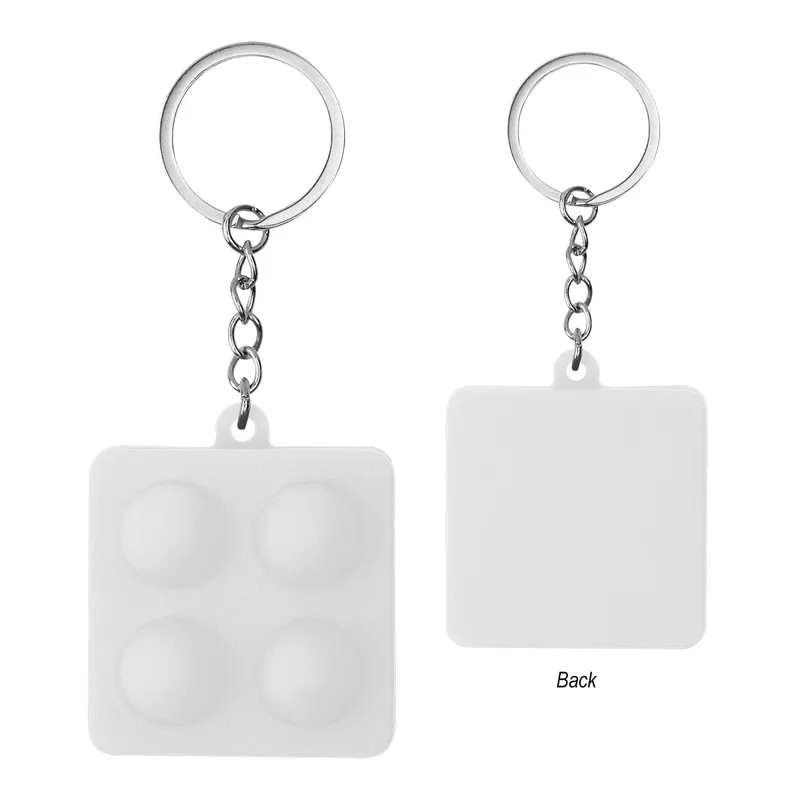 Right-side view of the push pop keychain in isolation