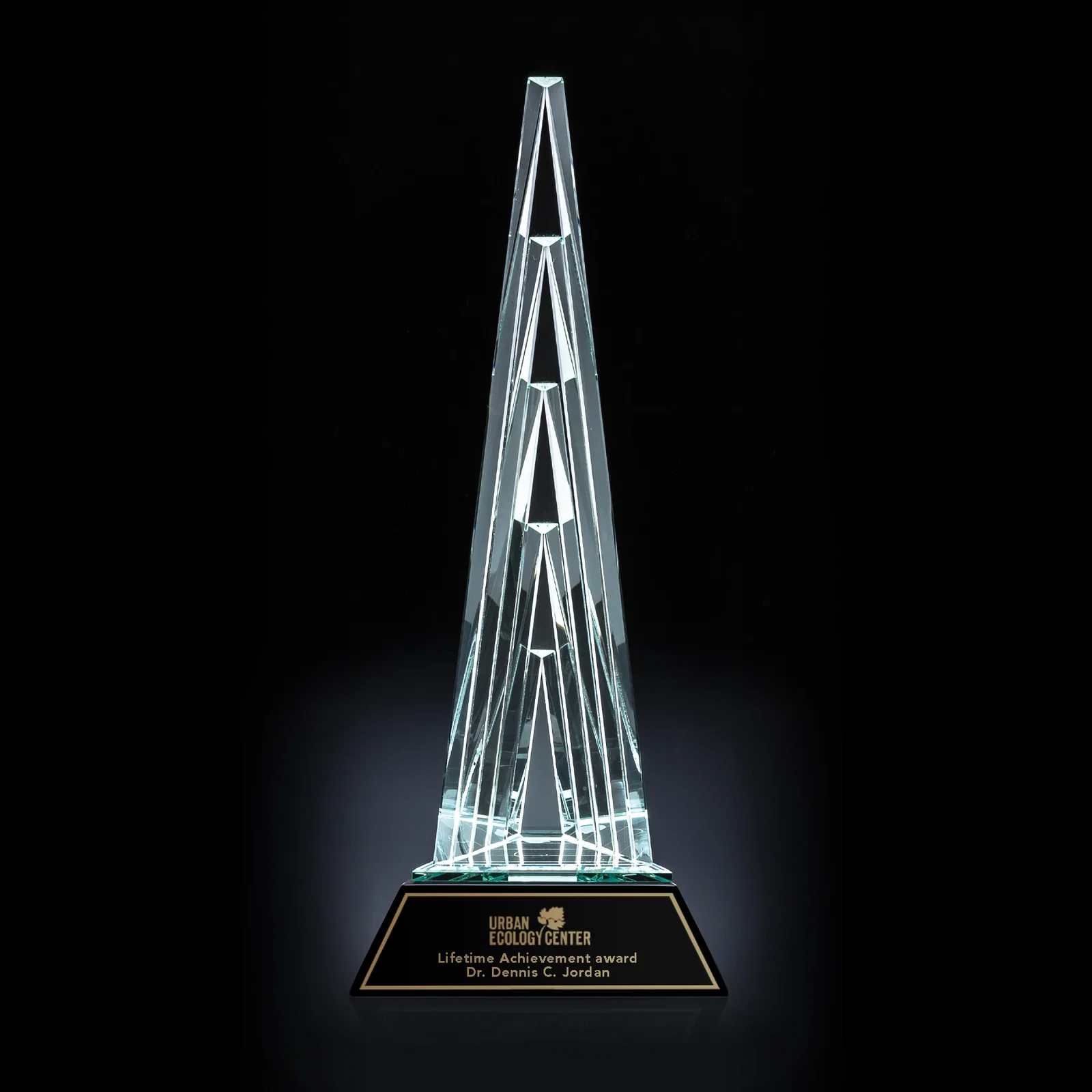 Custom Five-Piece Faceted Optical Crystal Tower Award with Laser Plate for employee recognition