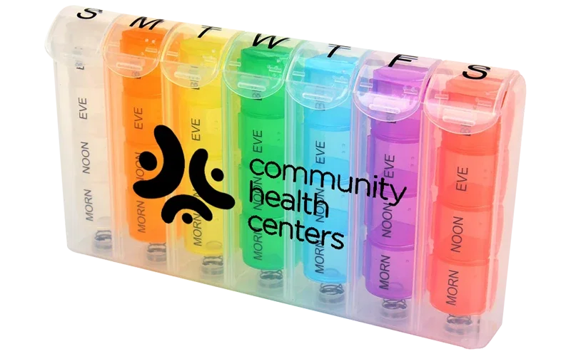Rainbow Pop-Up Weekly Pill Box. Rainbow 7-day pop-up pill box with color-coded compartments for pharmacy giveaways