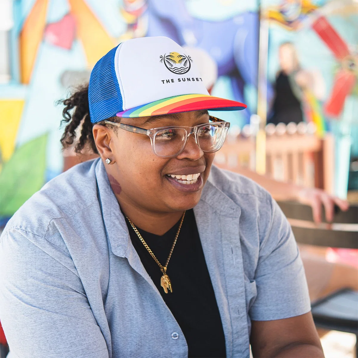 Custom Printed Rainbow Trucker Cap being worn