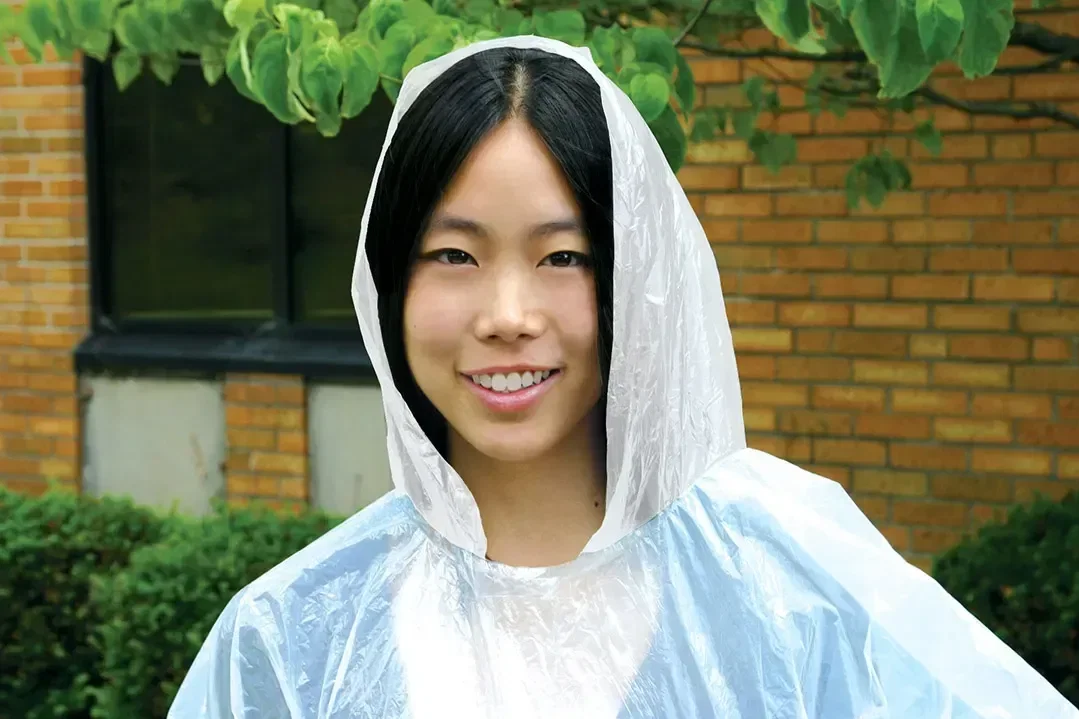 Rainy Day Twist-Open Poncho Ball being worn