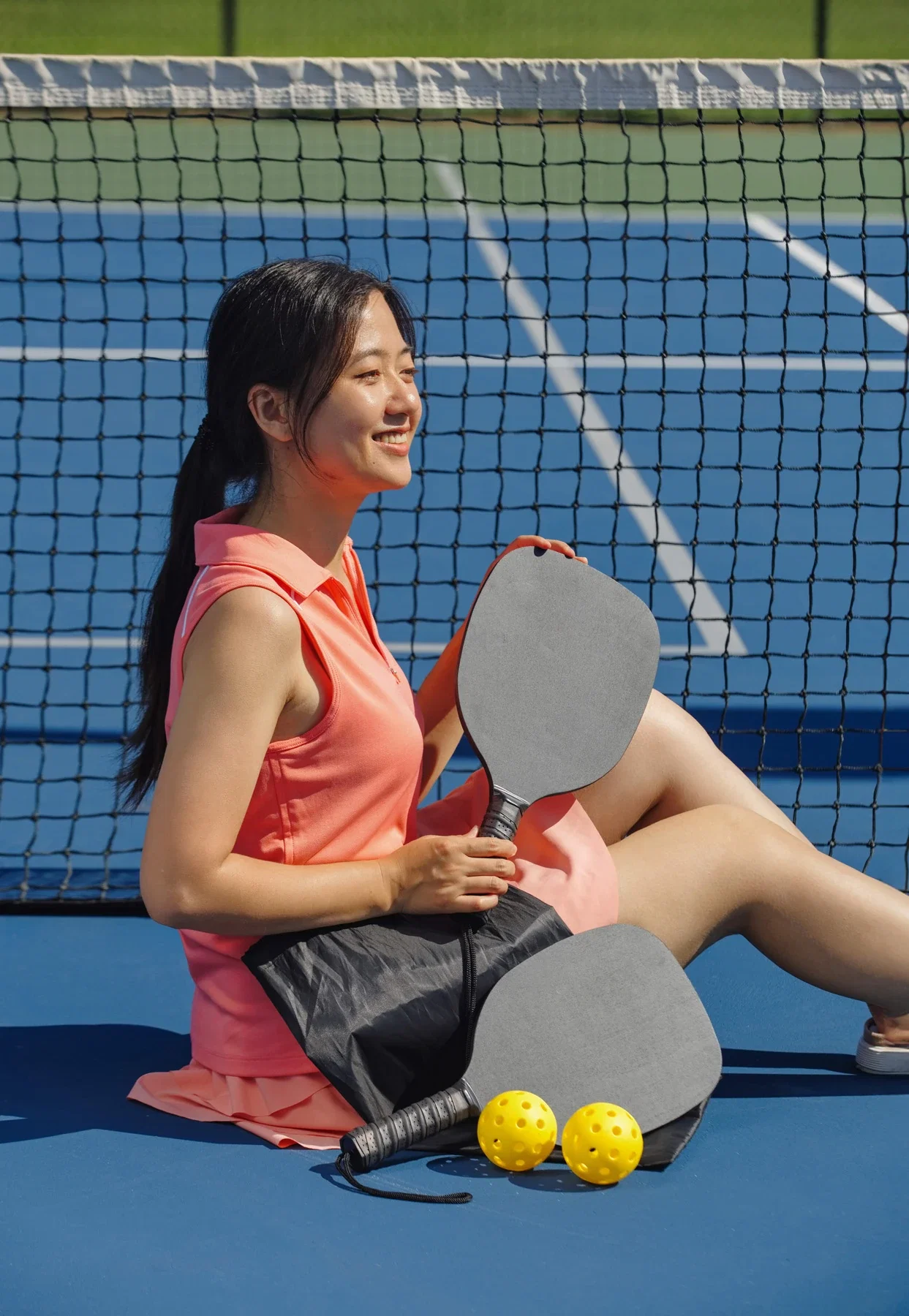 Rally Pickleball Set held in hand