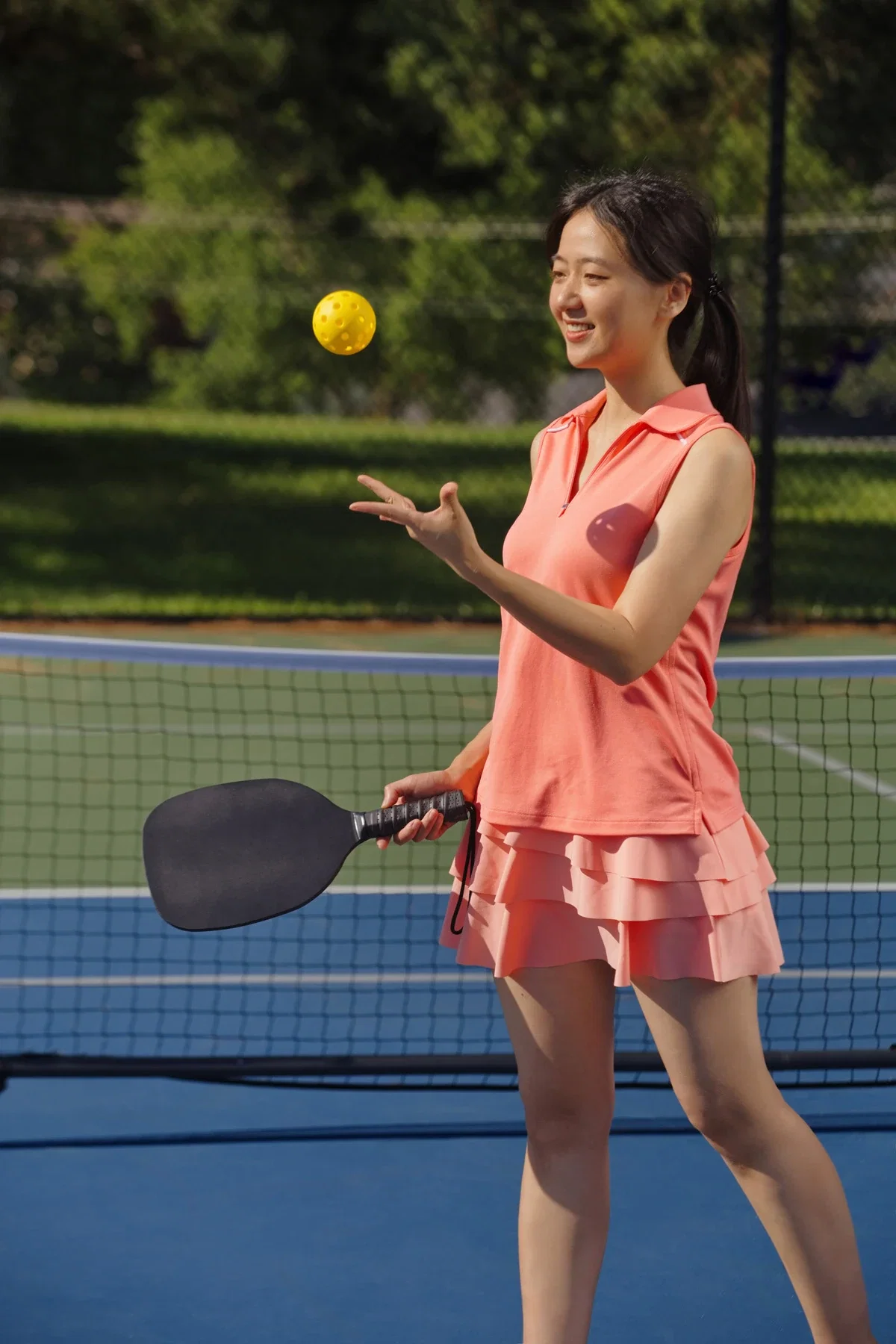 Rally Pickleball Set laid out on the court, promotional paddle set in use