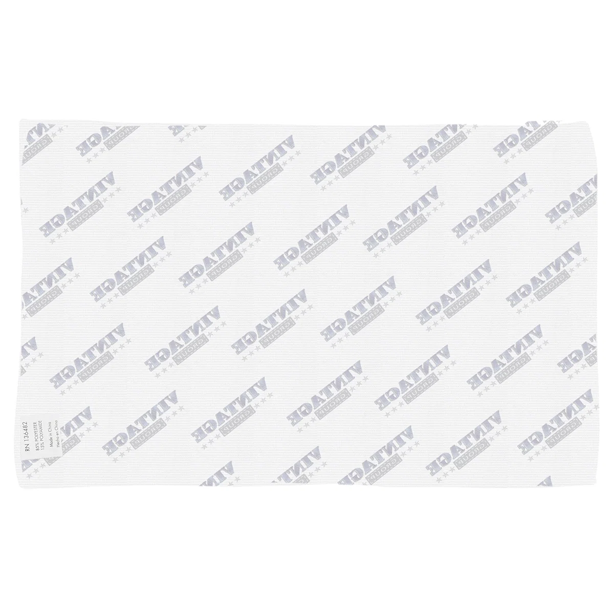 Hemmed edge detail along the side of the sports cloth