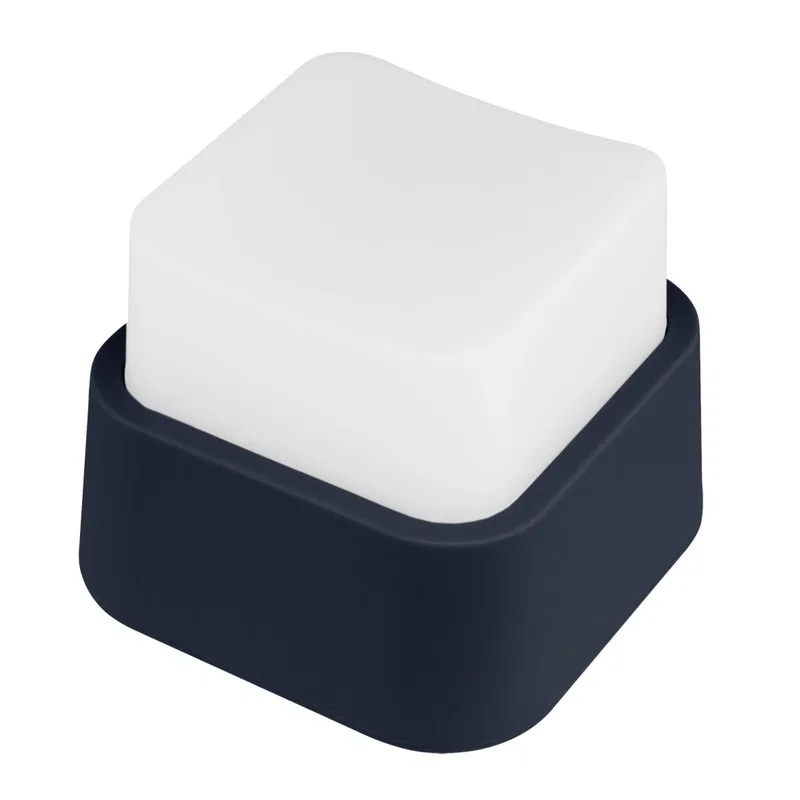 Held up to display the mini night light clearly