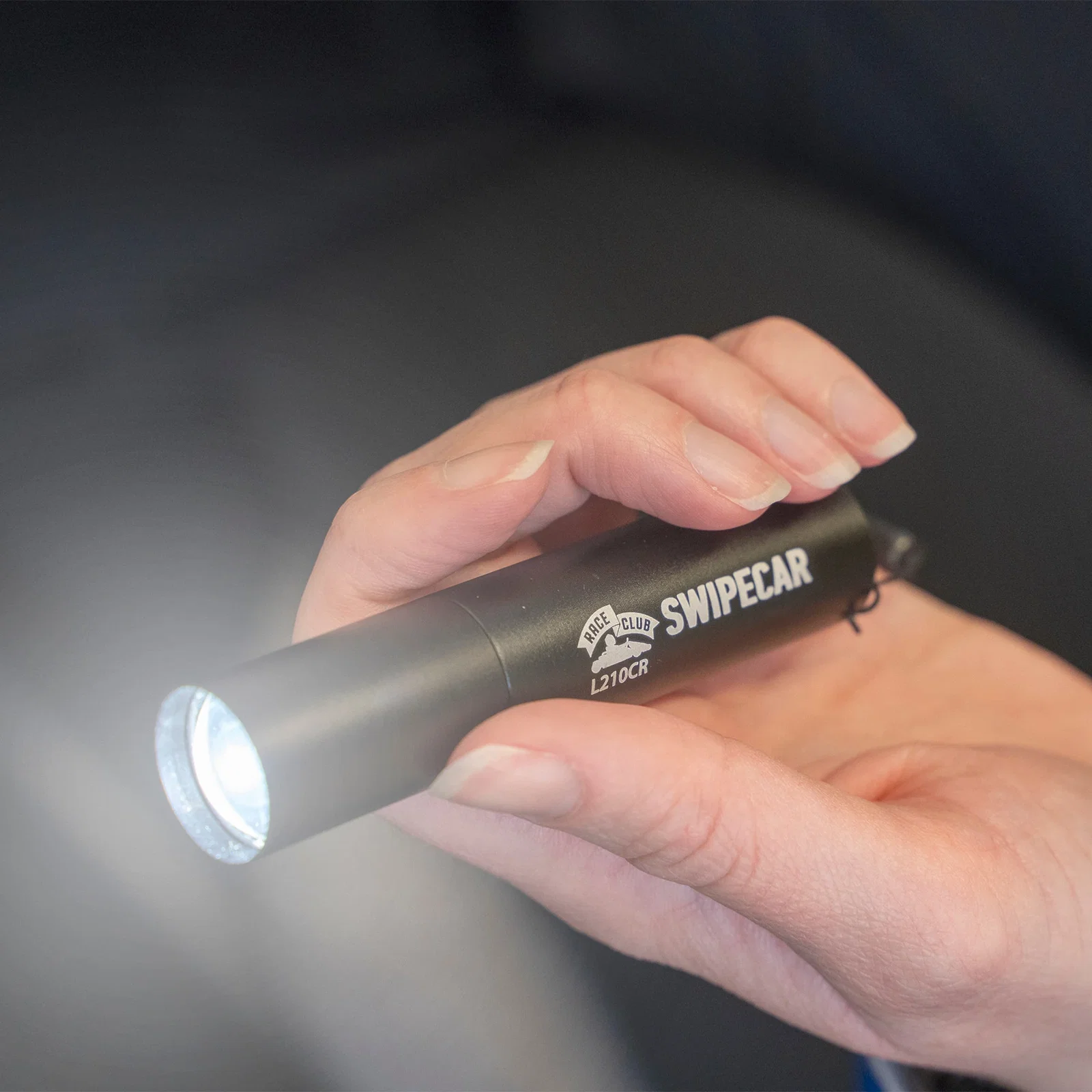 reNew Rechargeable Flashlight held in hand