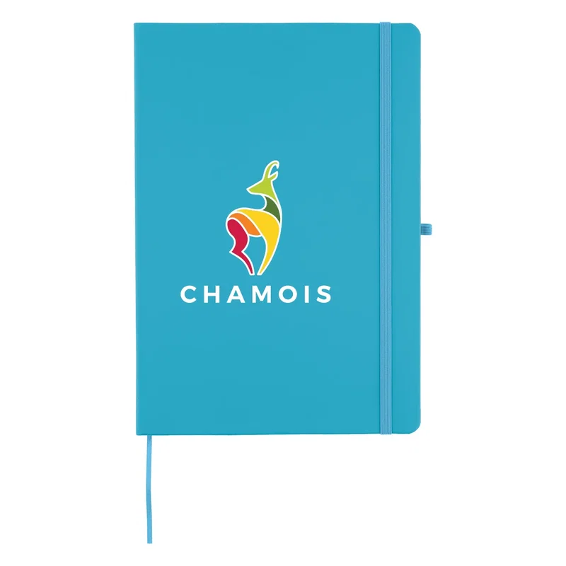 Branded notebook resting on a conference table before a session