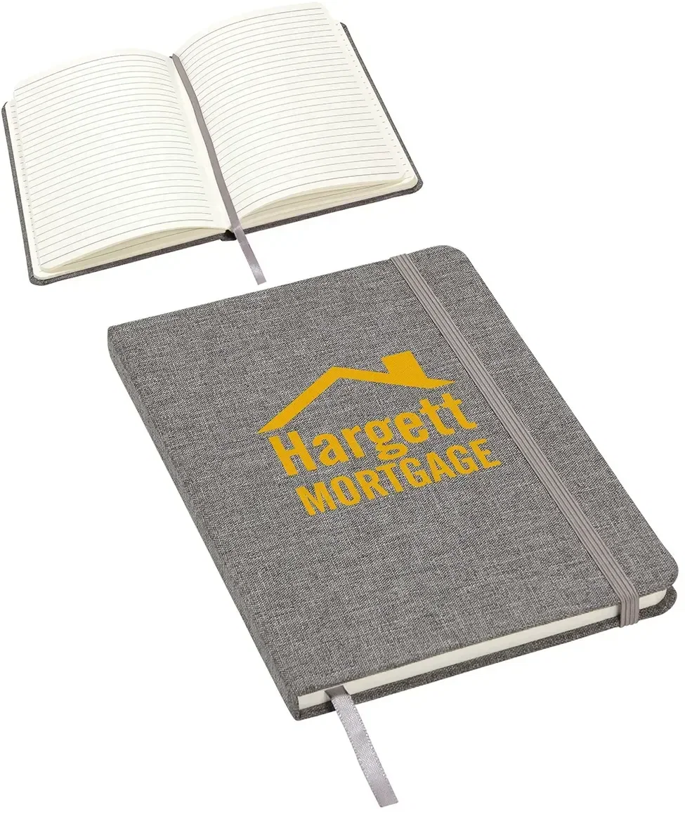 Close-up of logo imprint on promotional recycled textured journal