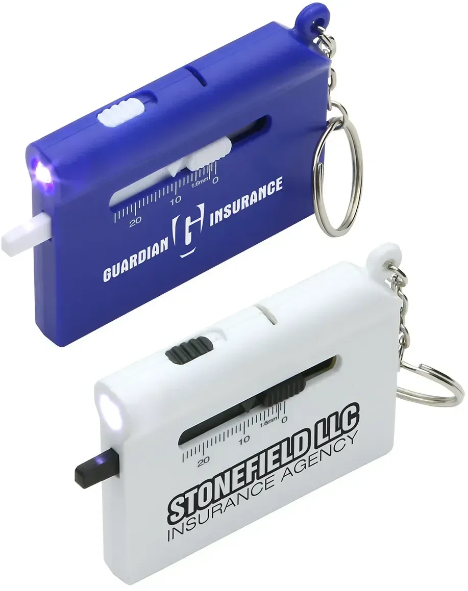 Roadside LED tire-gauge multi-tool, custom branded keychain auto accessory, front hero view