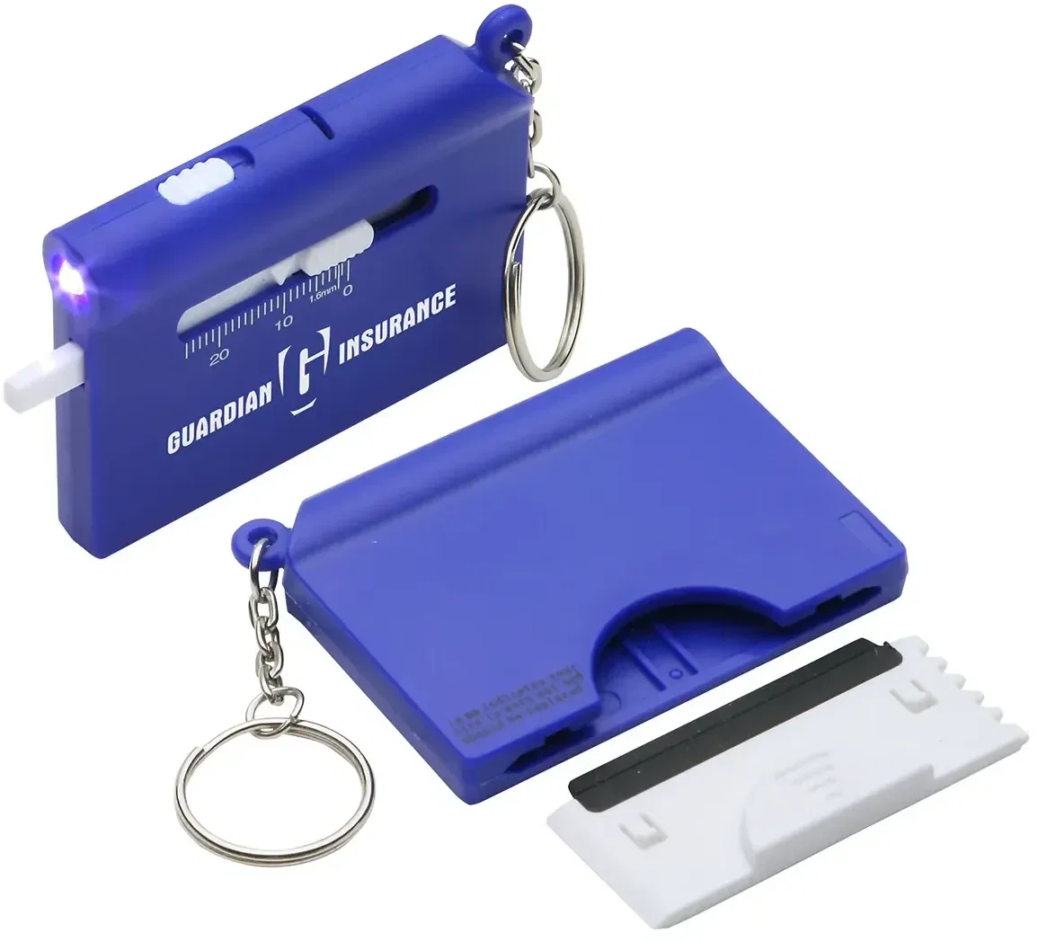 Branded Roadside LED keychain tool in a glovebox, lifestyle shot with logo