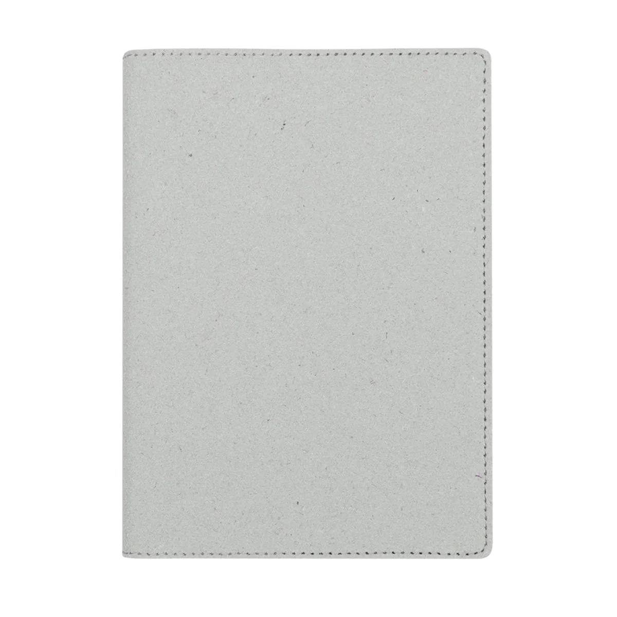 Open across a desk with blank sheets facing up