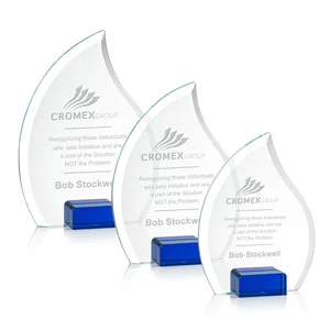 Starfire Crystal Flame Award Held Between Sapphire Panes