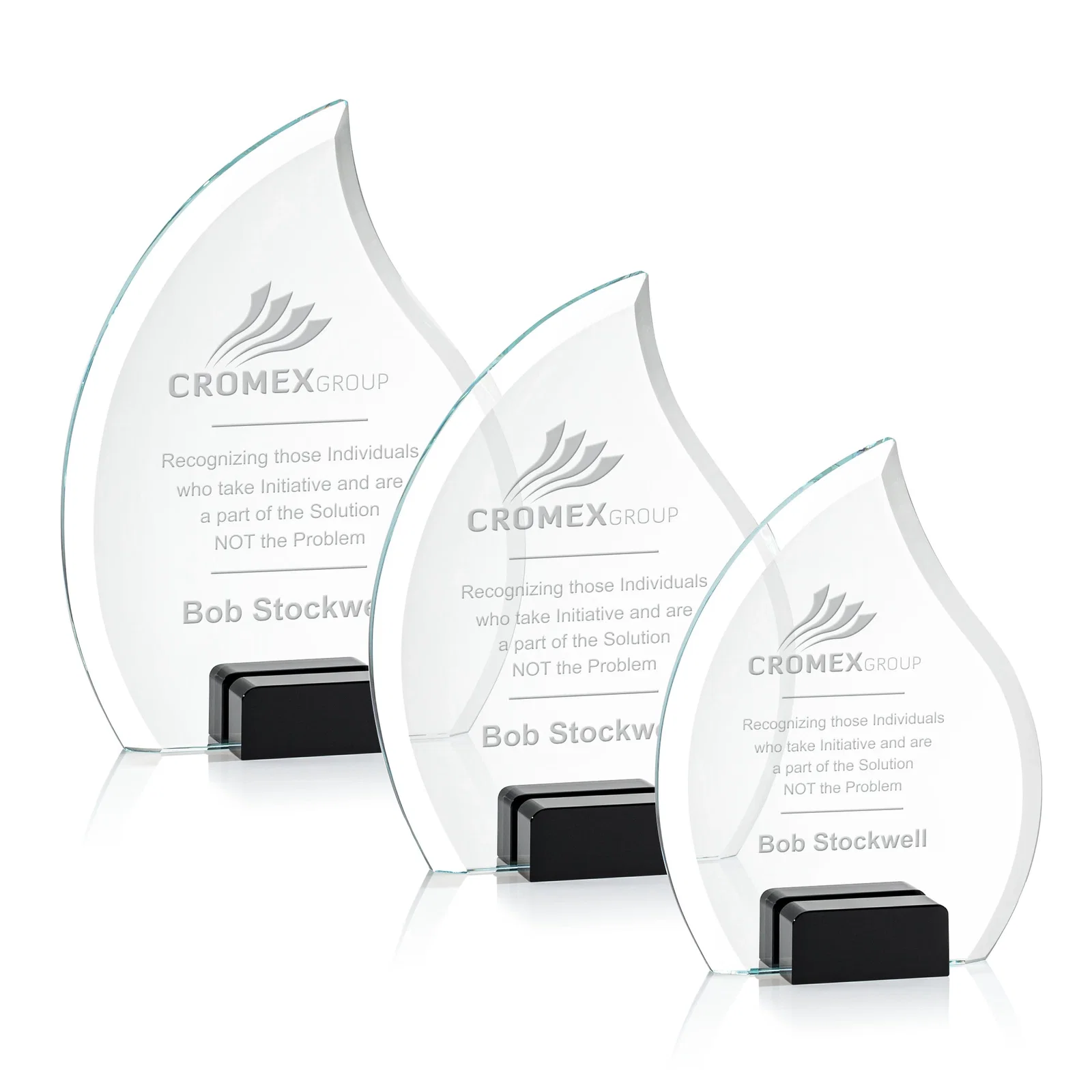 Personalized Starfire Crystal Flame Award Held Between Sapphire Panes for employee recognition
