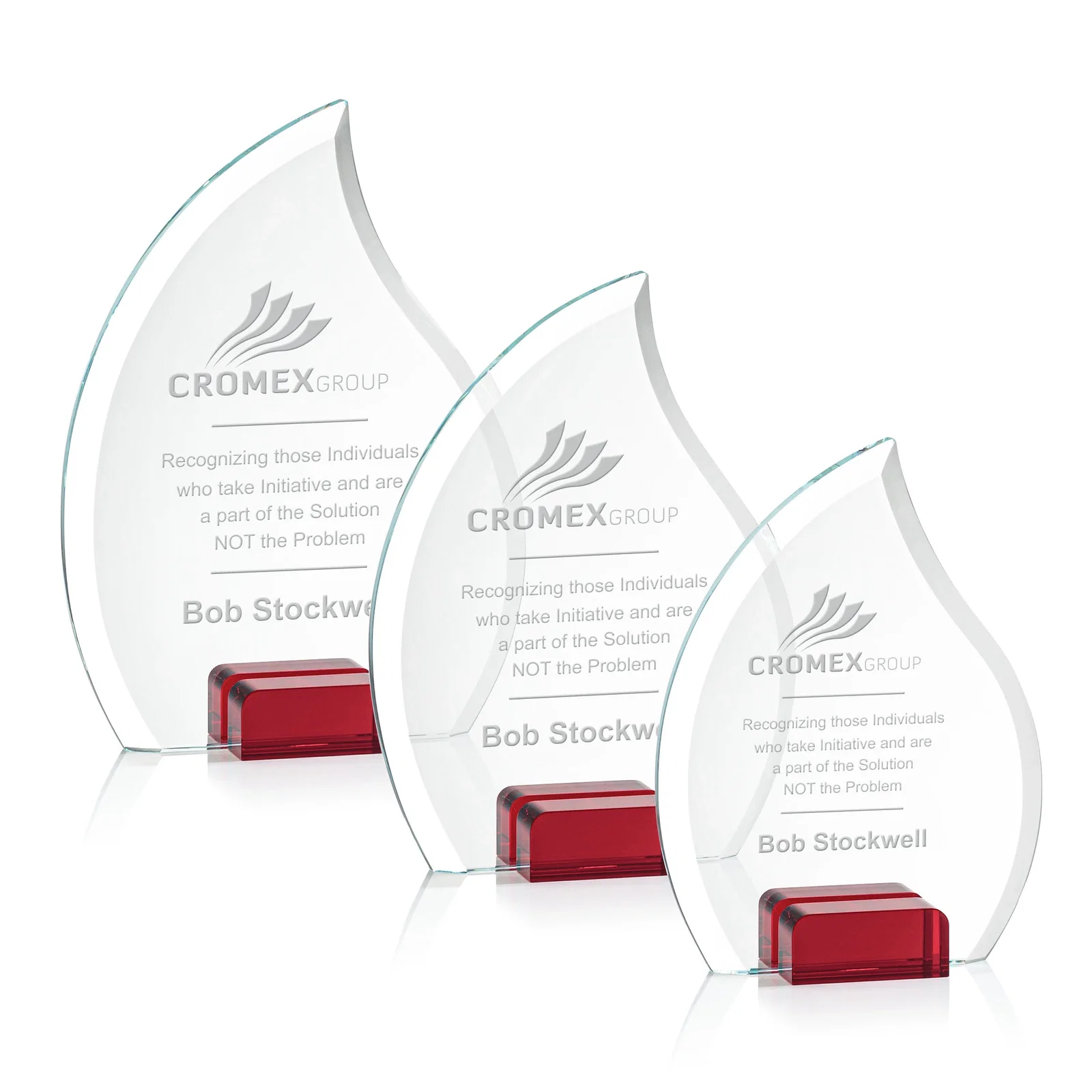Personalized Starfire Crystal Flame Award Held Between Sapphire Panes for retirement presentations