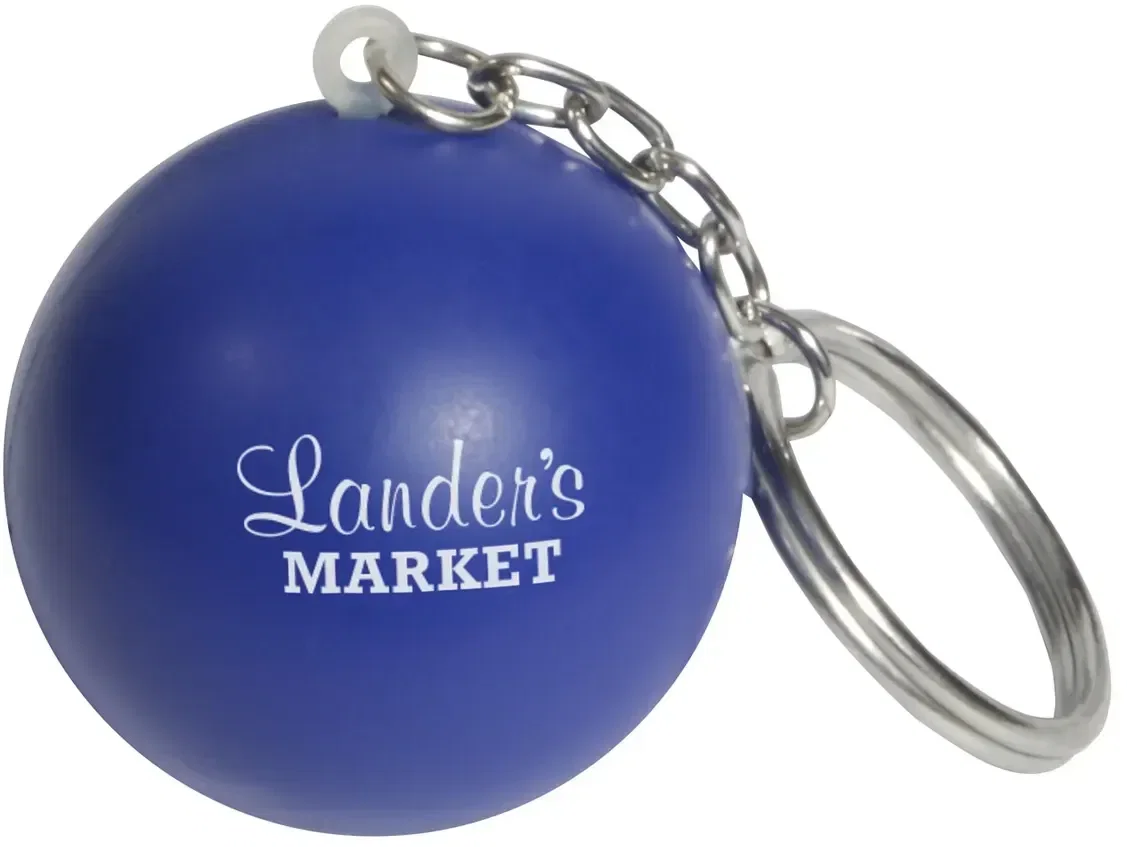Custom logo round stress ball keychain in an alternate color, promotional foam giveaway on keys