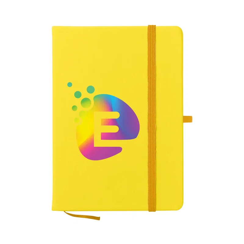 Held in one hand to show the size of the notebook