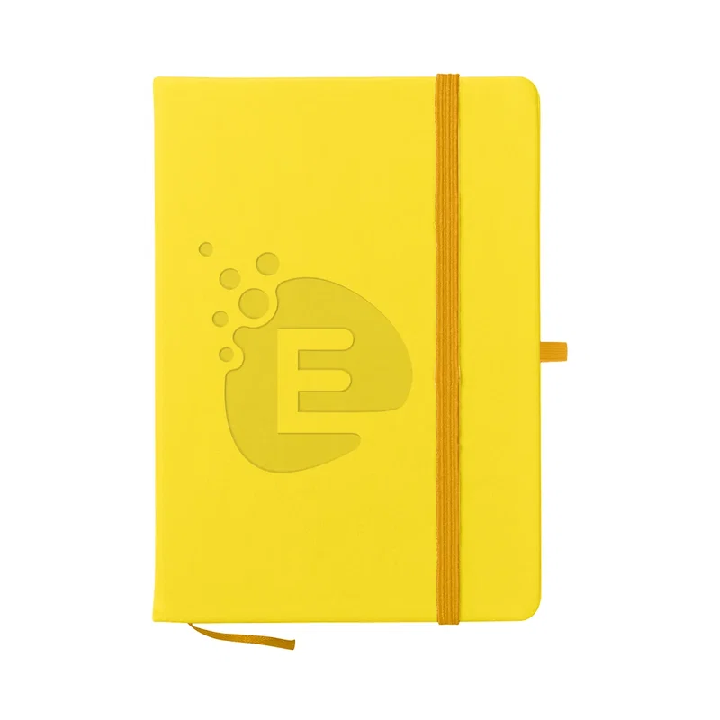 Ready for meeting notes, the notebook sits closed on a table