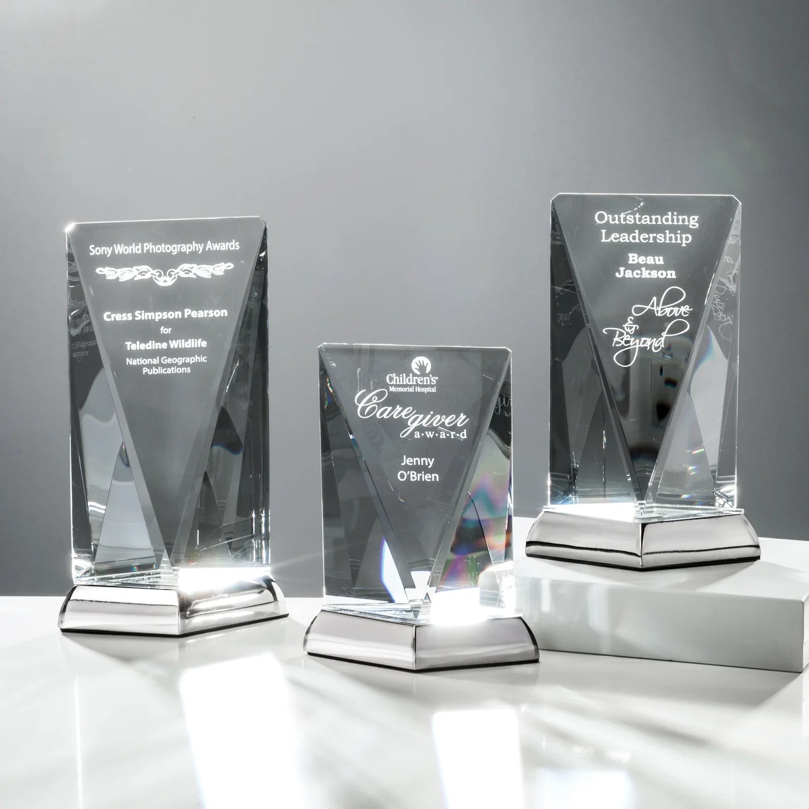 Custom Optical Crystal Award on Mirror-Topped Brushed Nickel Base, metal awards for employee recognition