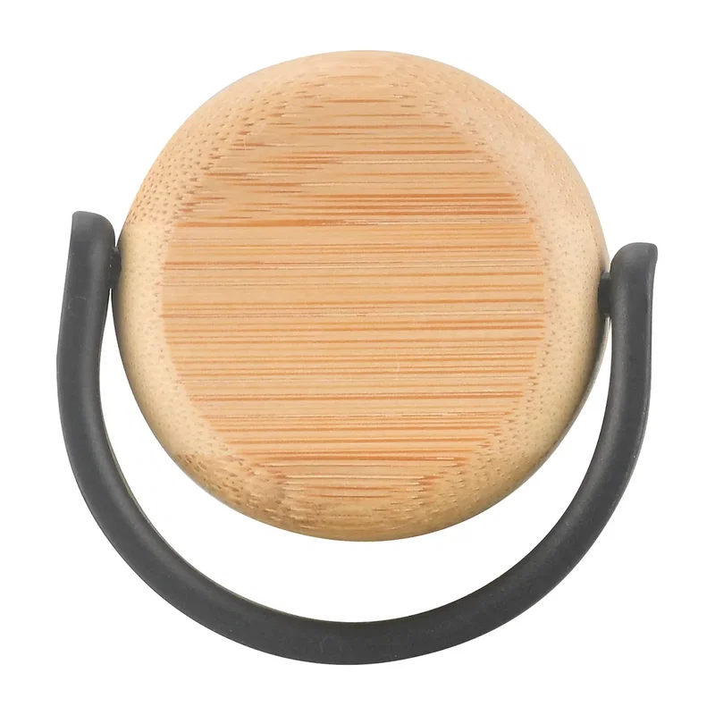 Close-up of the custom Sanzio bottle's bamboo lid and logo imprint area