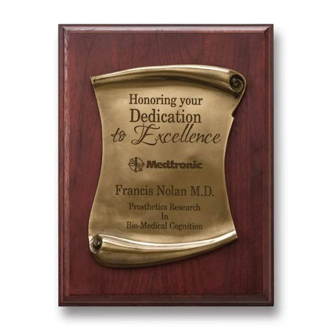 Custom Stonecast scroll wall plaque, spot-buffed antique finish on walnut, marble for corporate award ceremonies