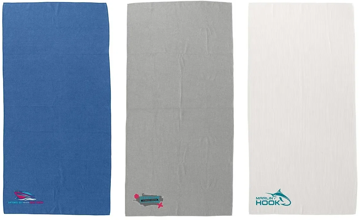 Seaside custom waffle beach towel with full-color branded logo print, spread flat