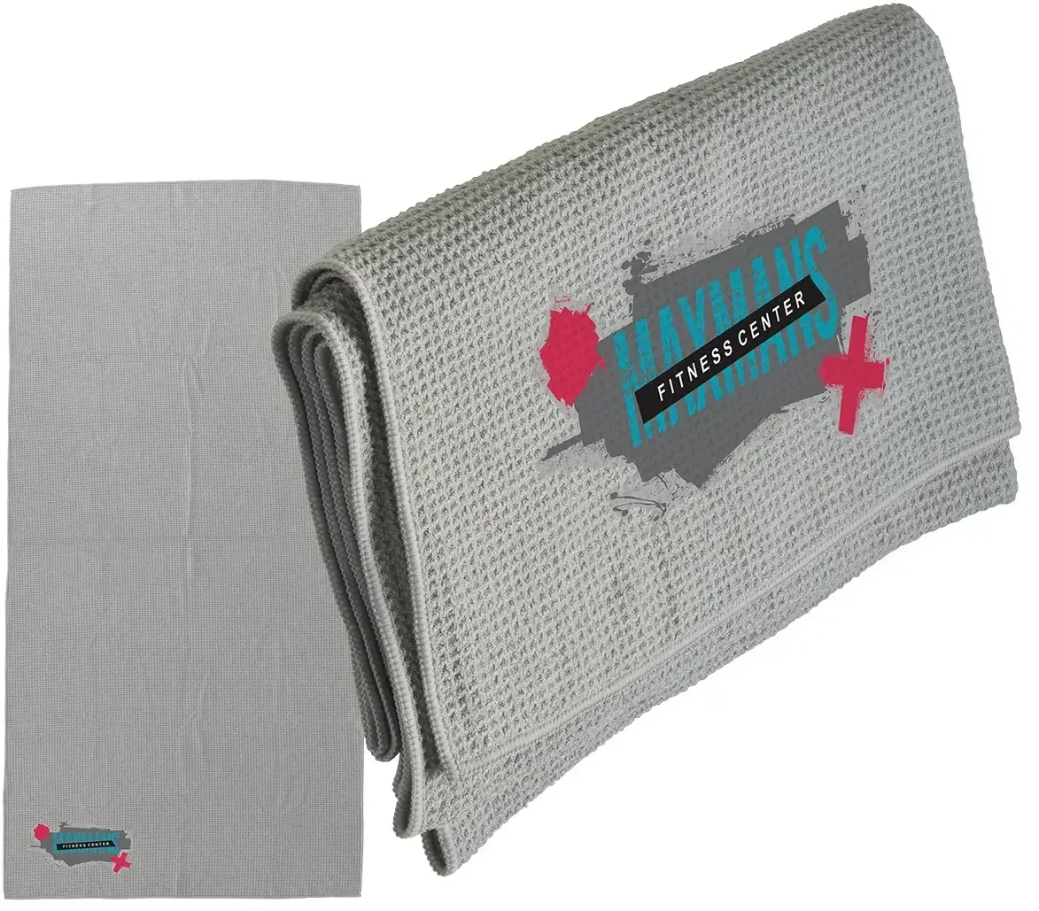 Promotional Seaside waffle beach towel folded showing branded logo corner
