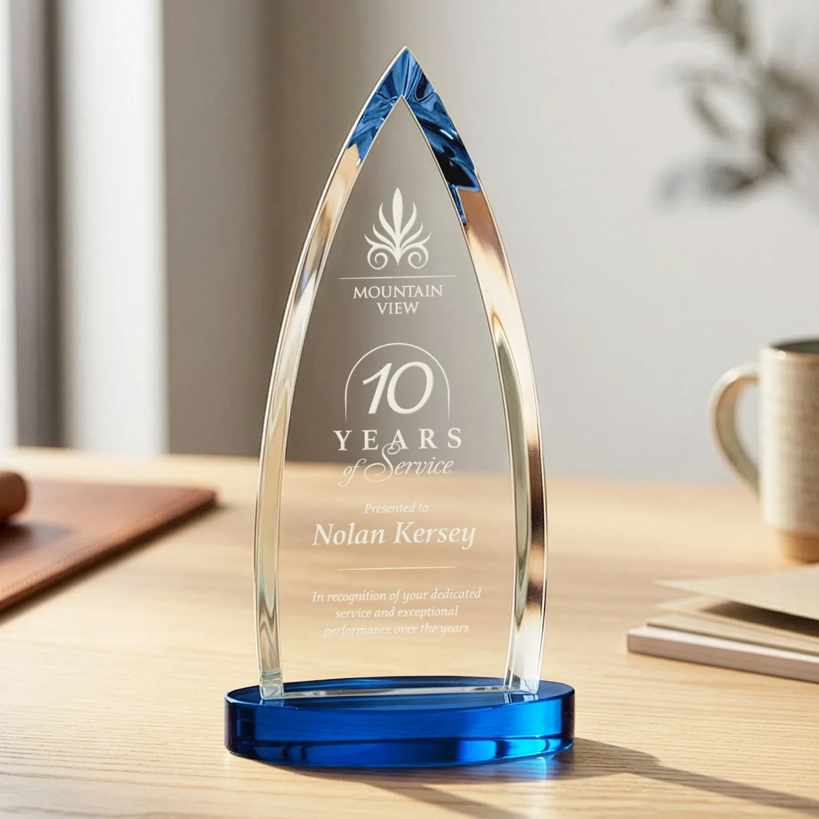Custom printed Starfire Crystal Arrowhead Award on Round Crystal Base for graduation ceremonies