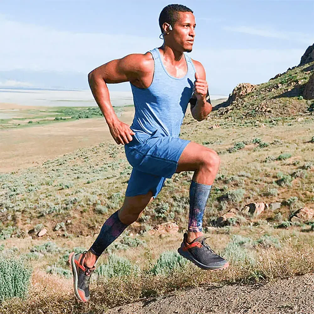 Shokz OpenRun Bone Conduction Open-Ear Endurance Headphones being worn