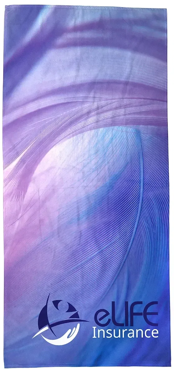 Custom Silk Touch velour beach towel folded to show its soft 300GSM pile and logo area