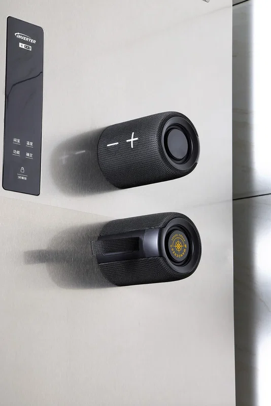 Angled view of the custom Silo Dual Wireless Speaker Set showing the paired units