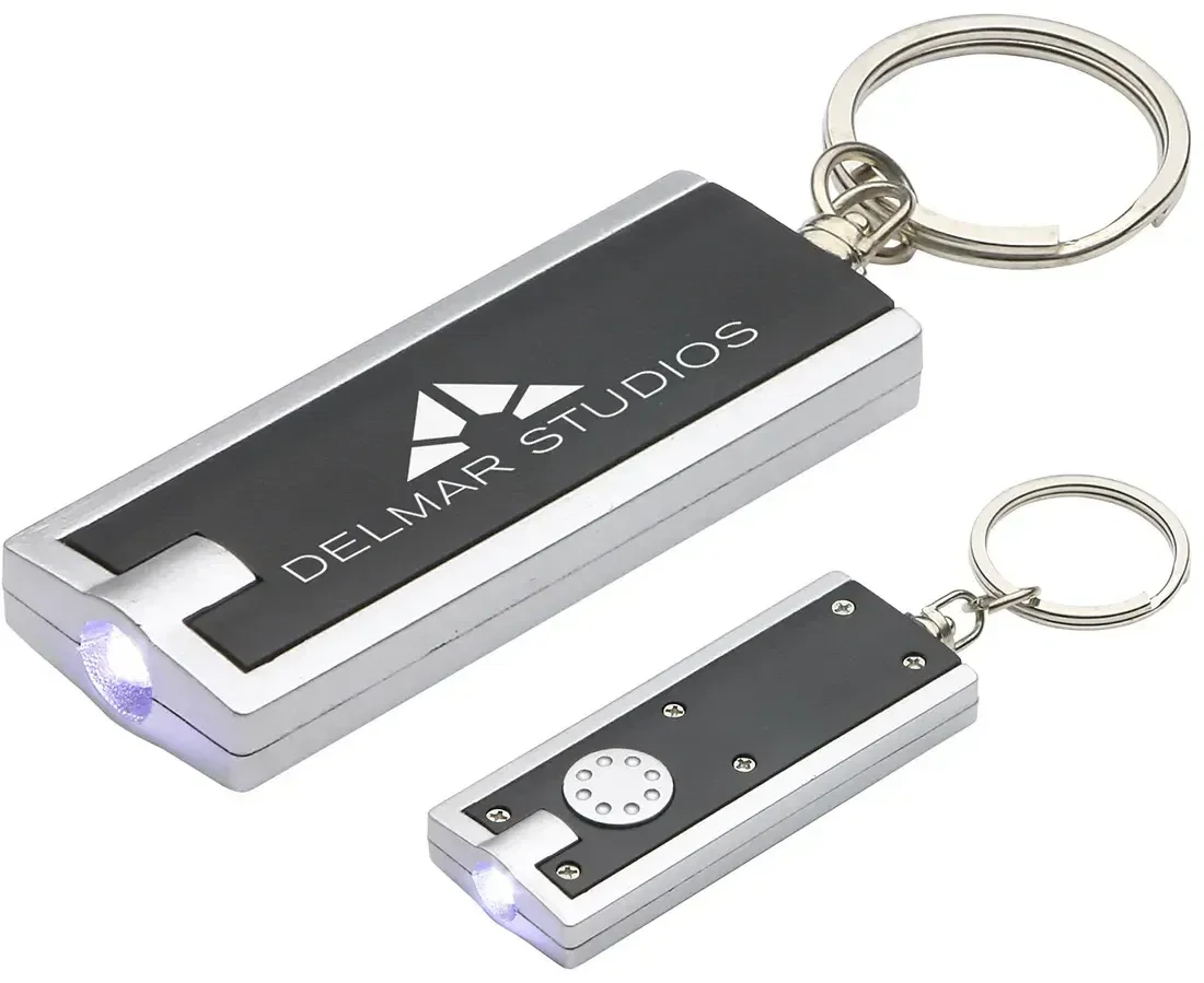 Promotional push-button LED key chain light showing split ring attachment