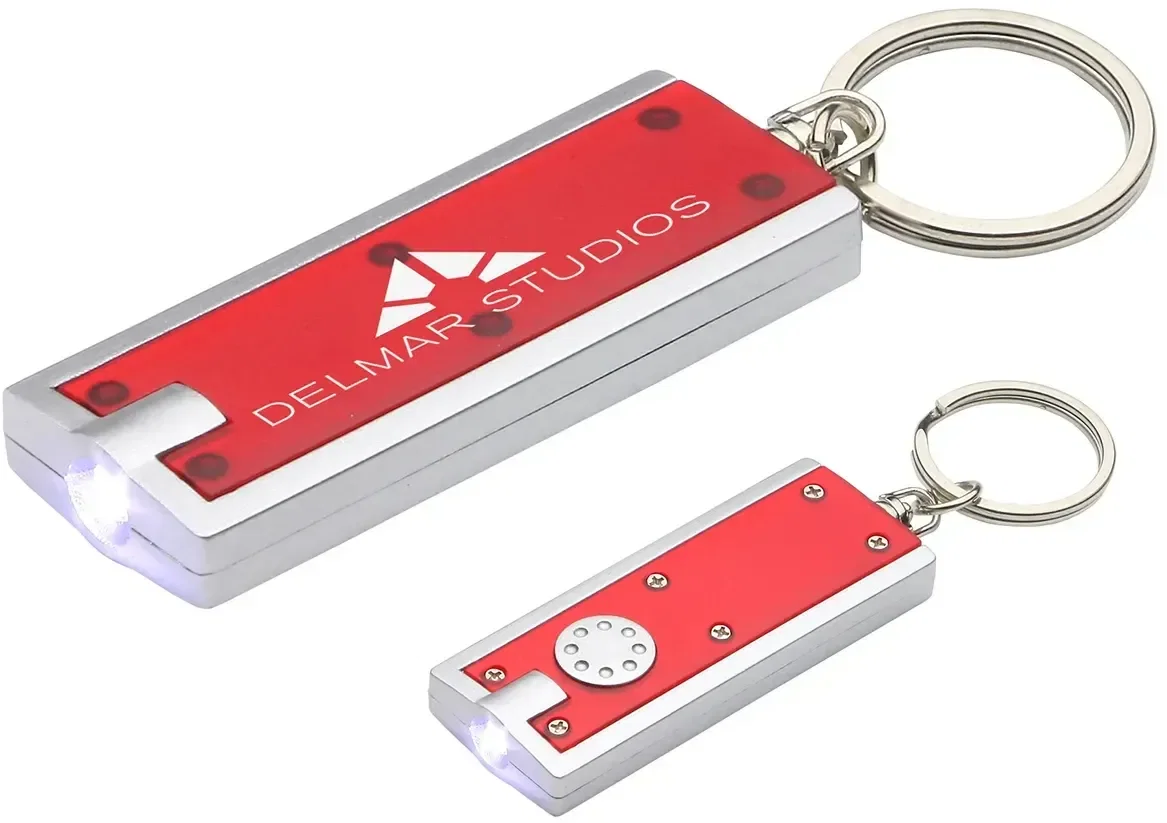 Branded key chain light with LED beam switched on