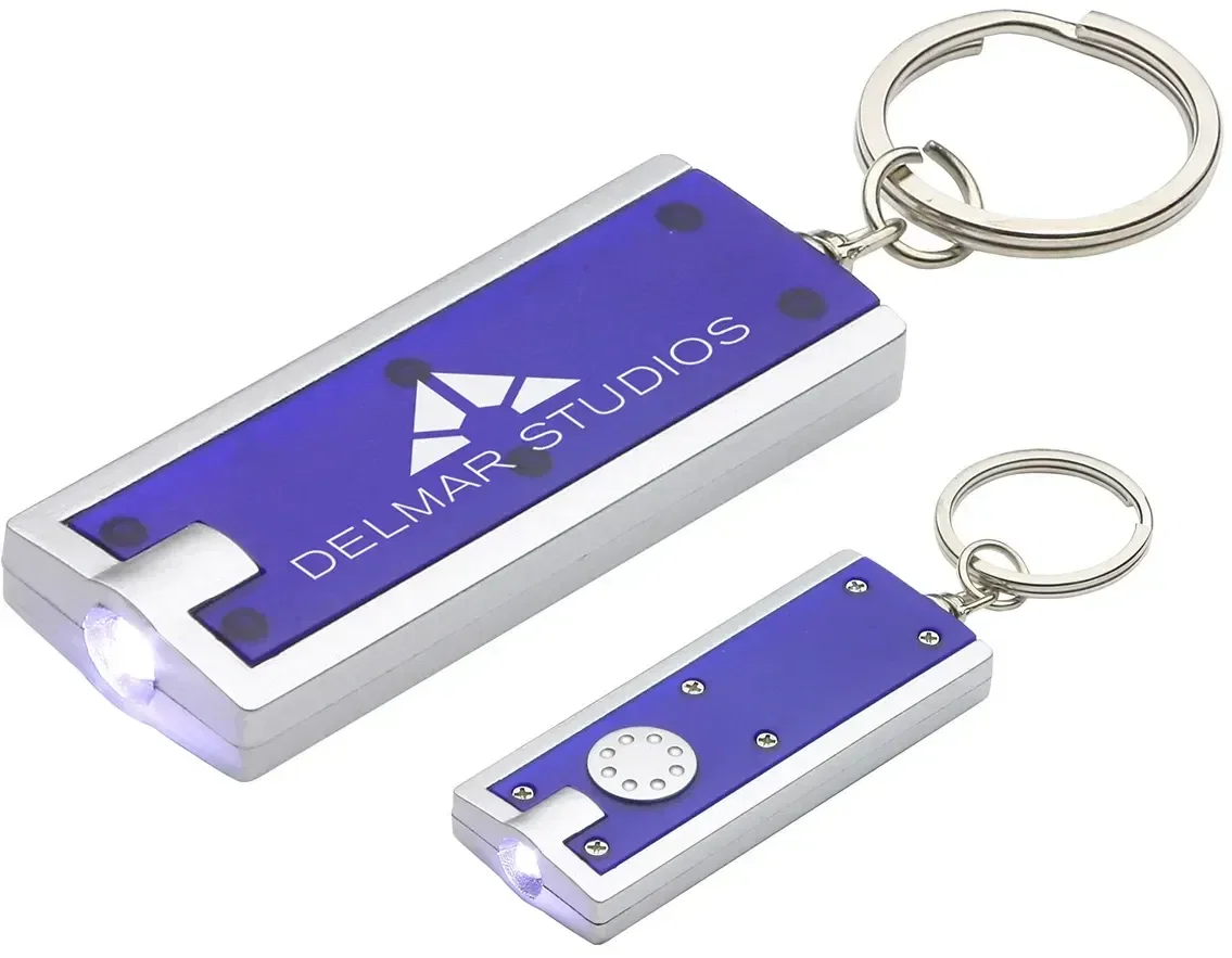 Close-up of custom LED key chain push-button and compact housing