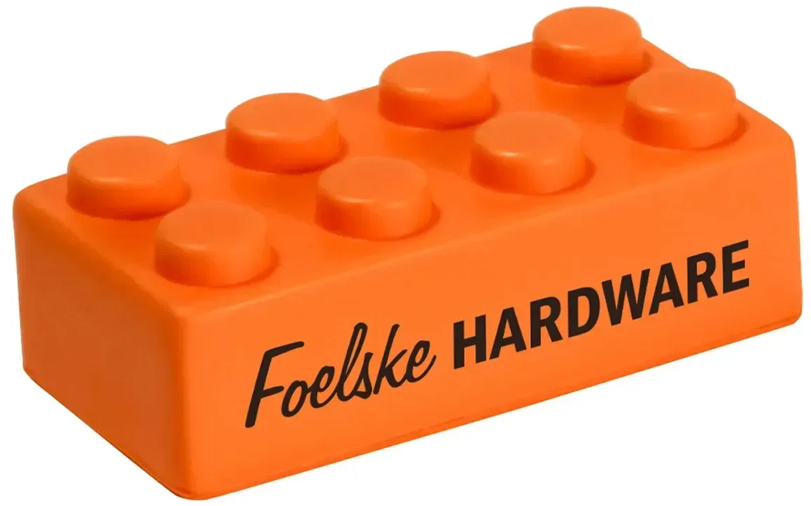 Top view of the custom building block stress reliever showing the studs, branded education promotional squeeze toy