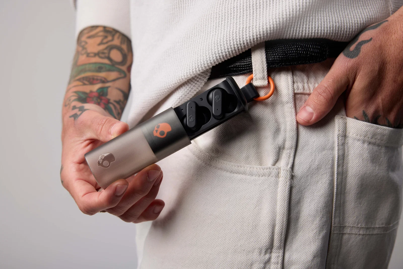 Skullcandy Dime Evo True Wireless Earbuds, 36-Hour Battery held in hand