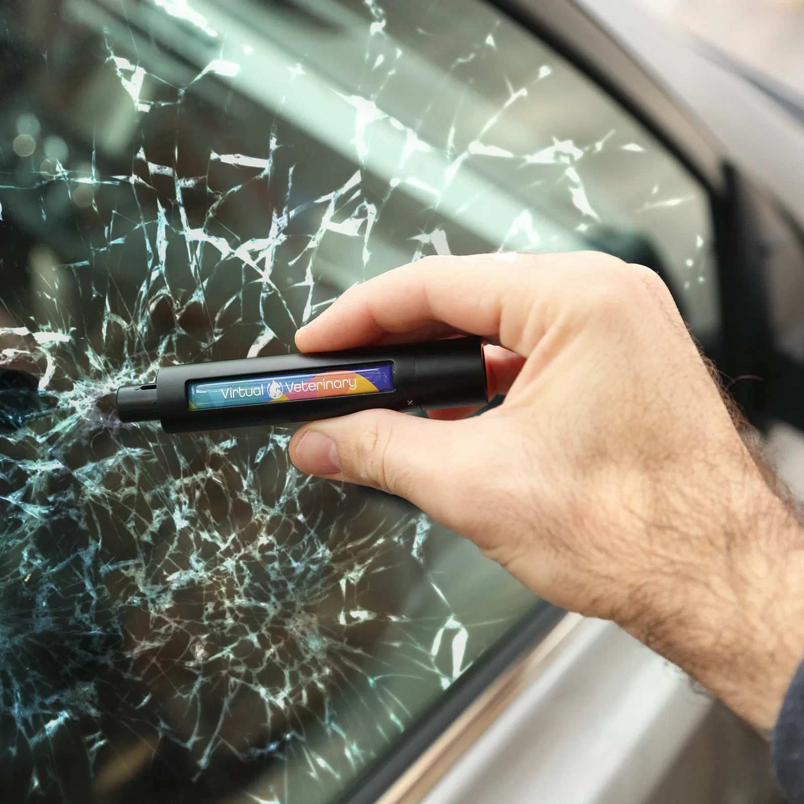 Slash N Smash Emergency Car Tool held in hand