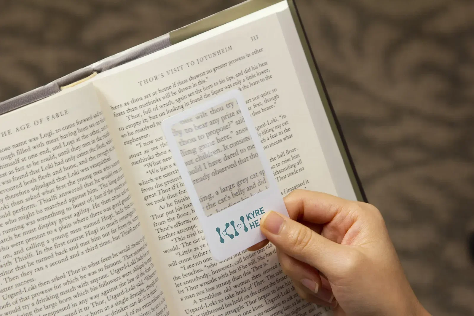 Slimcard 3X Pocket Magnifier held in hand