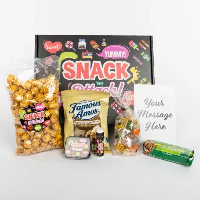 Snack assortment presented in a tall narrow gift box