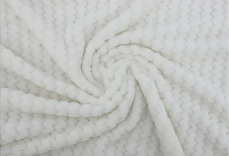 Group shot of Snuggle Up Soft-Textured Blankets stacked together