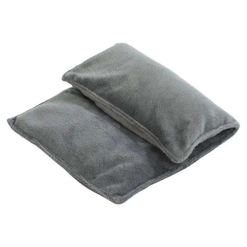 Branded Solace Himalayan Salt Pillow warming on a heating pad, in-use shot