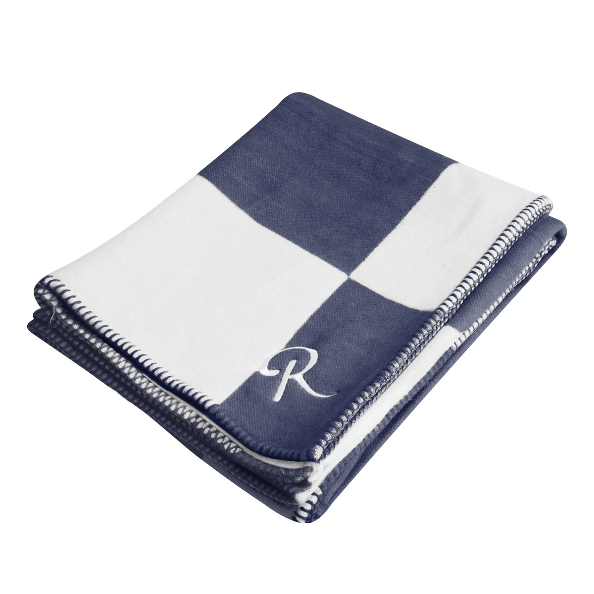 Navy and white colorway draped over a chair arm