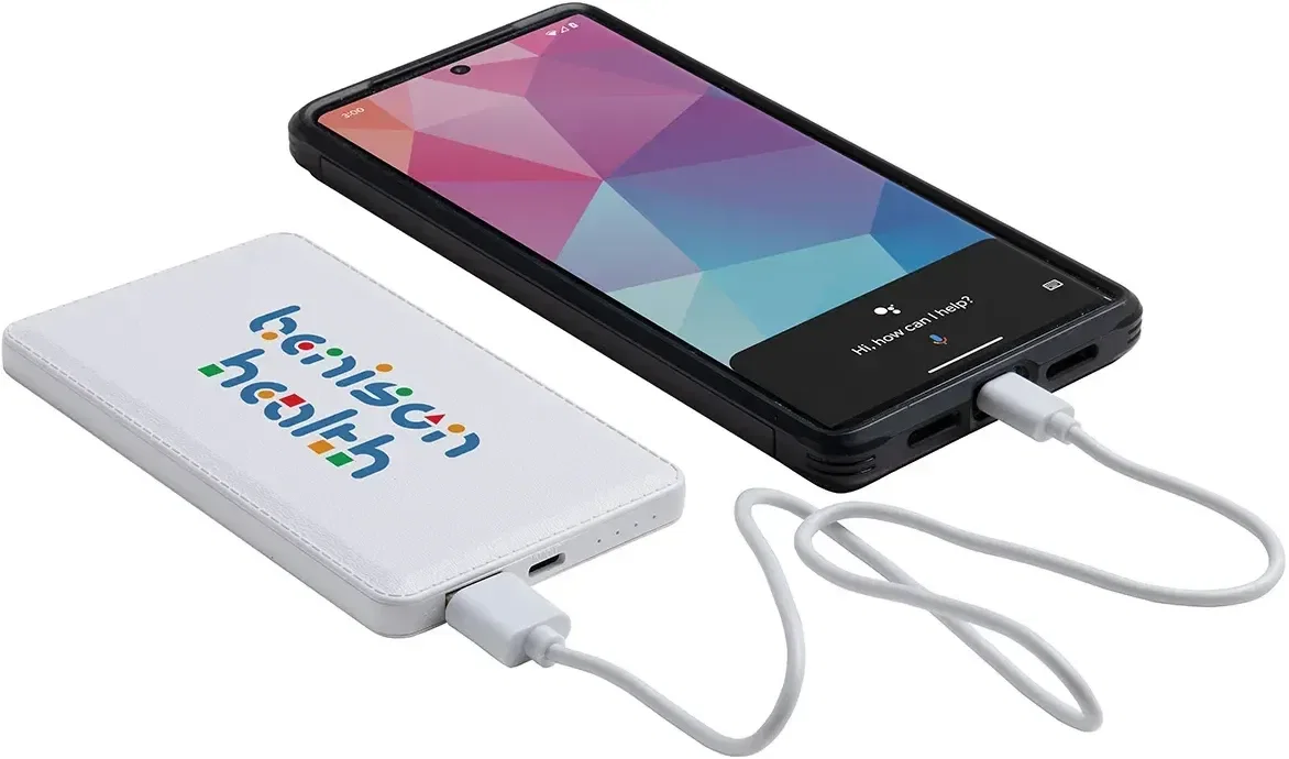 Custom Sovereign wireless power bank charging a phone, in-use view