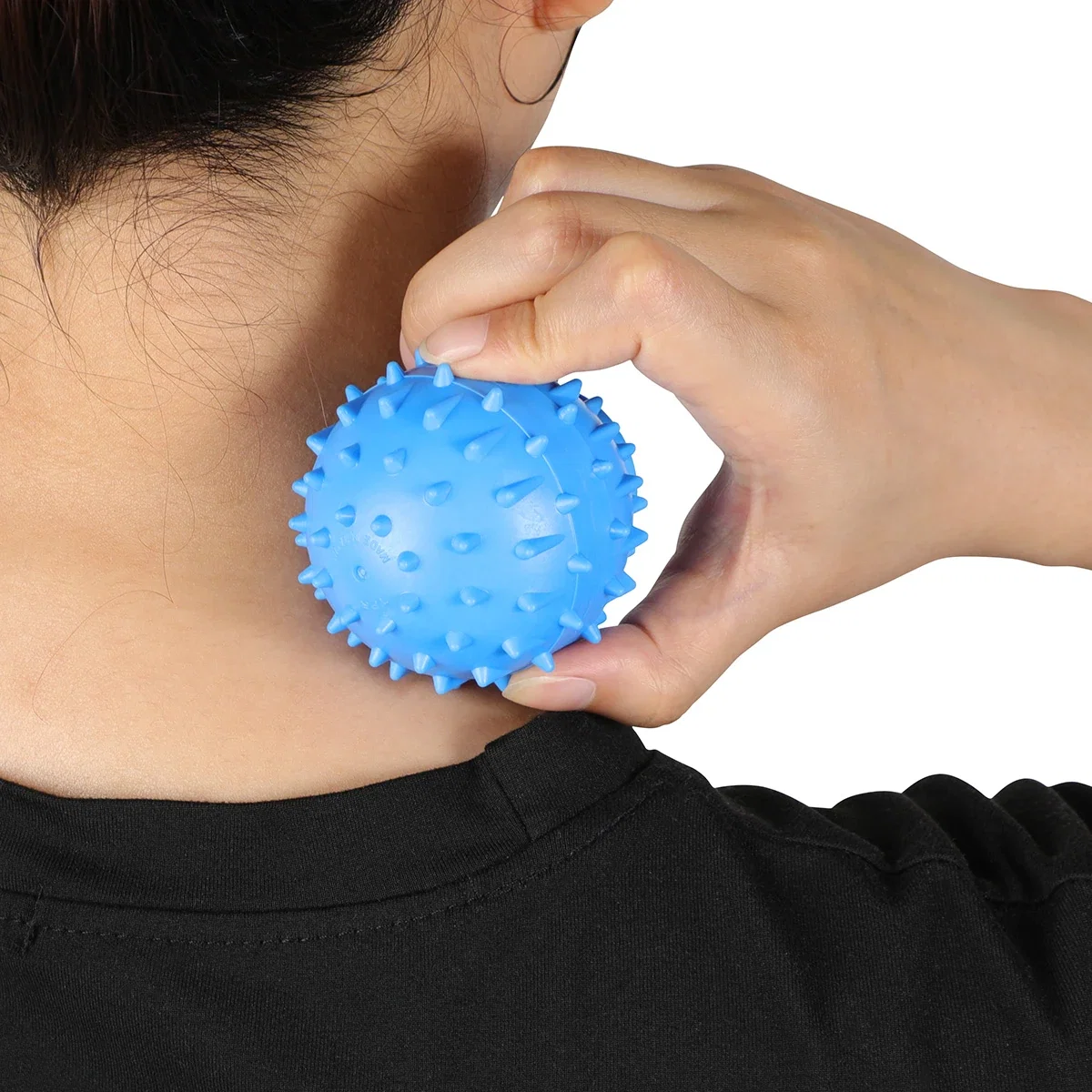 Spike Massage Ball in use