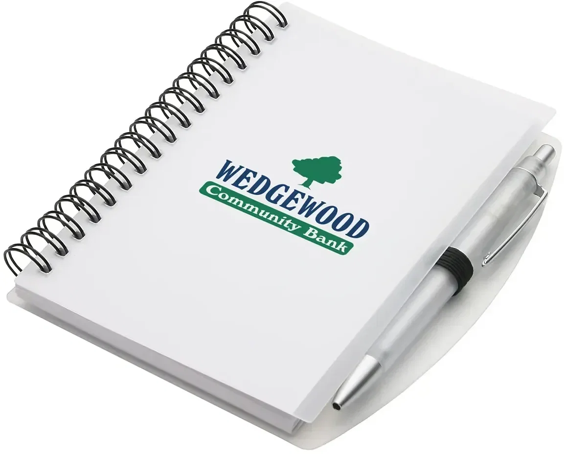 Open custom notebook showing lined pages and spiral binding