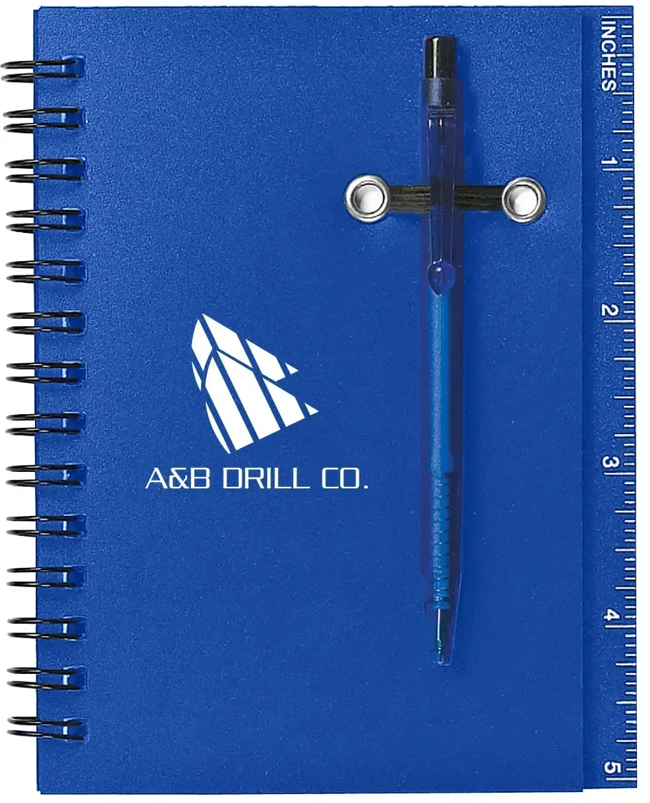 Small spiral notebook with a matching pen tucked into the coil