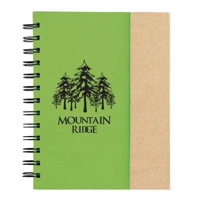 Open book showing note pads and ruled writing sheets